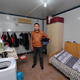 Illustration for article titled Chinas Cabinet Tribe Lives in Shipping Containers